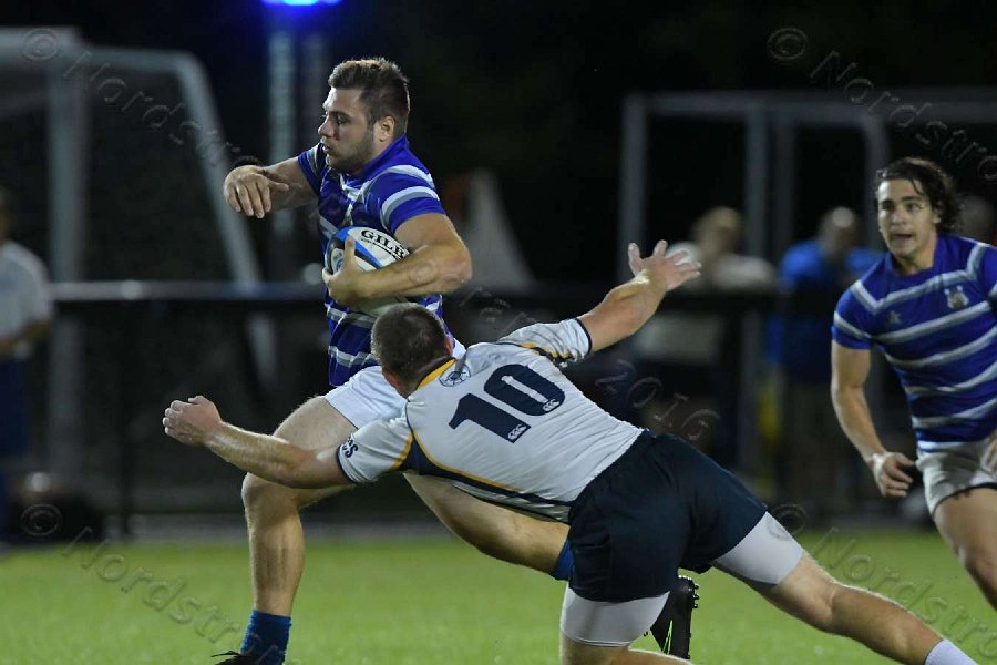 Wheaton Men\'s Rugby vs Mass Maritime.  Photo by Keith Nordstrom